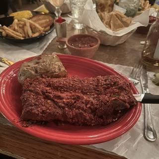 El Pinto Restaurant and Cantina signature dishes Red Chile RibsThe Best Nachos in AmericaGrilled Chicken Sandwich